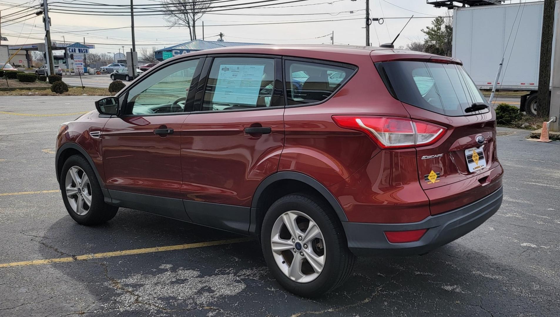 2014 Ruby Red /Black Ford Escape S (1FMCU0F72EU) with an 4-Cyl, 2.5 Liter engine, Automatic transmission, located at 341 N White Horse Pike, Lawnside, NJ, 08045, (856) 262-9500, 39.855621, -75.027451 - Photo#3